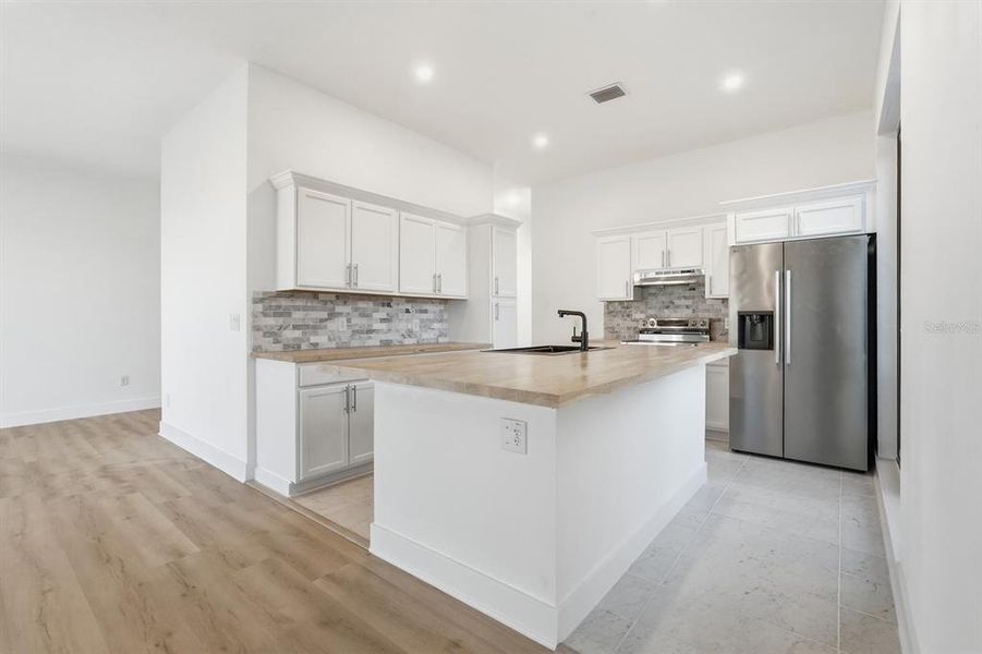 Furnished interior view inside a new home in , Flagler Beach (Image 5).