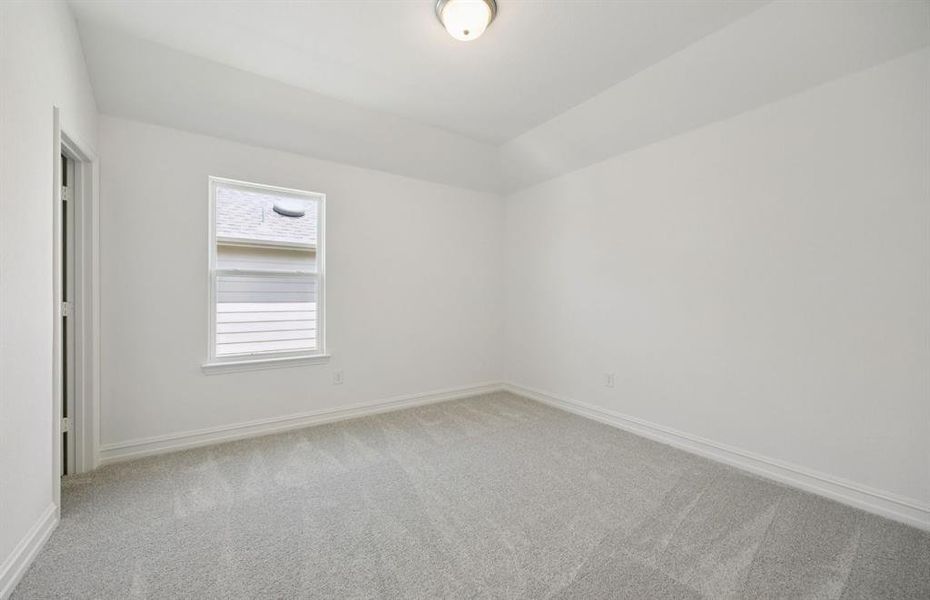 Spacious secondary bedroom features ample closet space *Real home pictured Spacious secondary bedroom features ample closet space *Real home pictured