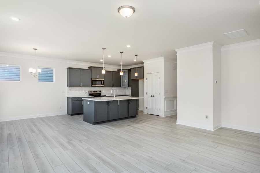Furnished interior view inside a new home in 1158 Place, Wilson (Image 12).
