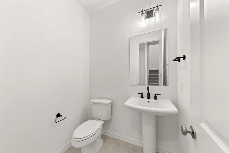 Brown plan powder bathroom