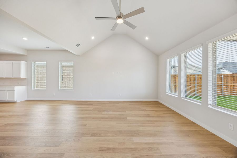Living and Dining Room in the Stanley II home plan by Trophy Signature Homes – REPRESENTATIVE PHOTO