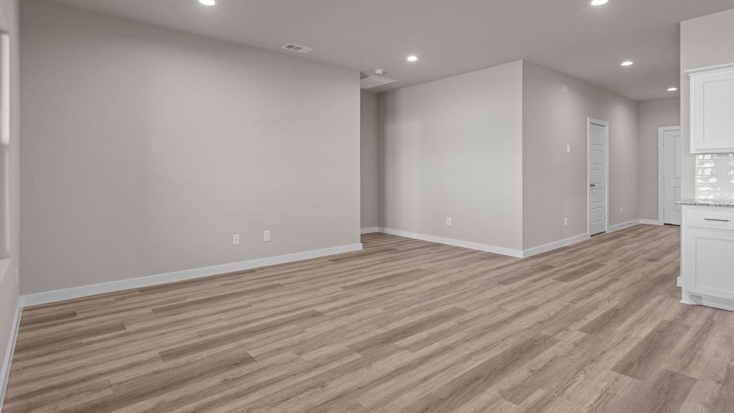 Representative unfurnished interior of a home built from the NAPLES by D.R. Horton in Homestead at Parks Bell Ranch, Odessa (Image 9).