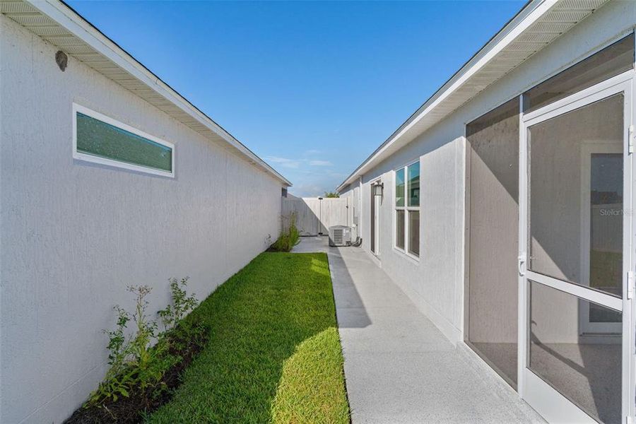 Exterior details and patio area of a home in , The Villages (Image 35). Exterior details and patio area of a home in , The Villages (Image 35).