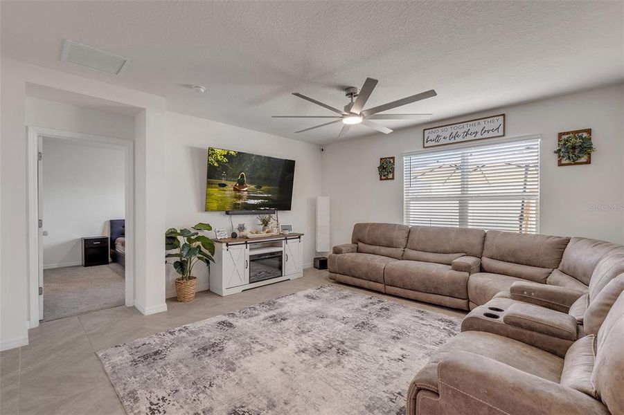 Furnished interior view inside a new home in Groveside at Ormond Station, Ormond Beach (Image 29).