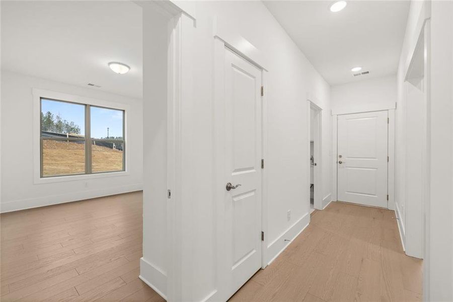 Spacious, unfurnished interior of a new home in Soleil Belmont Park, Canton (Image 51).
