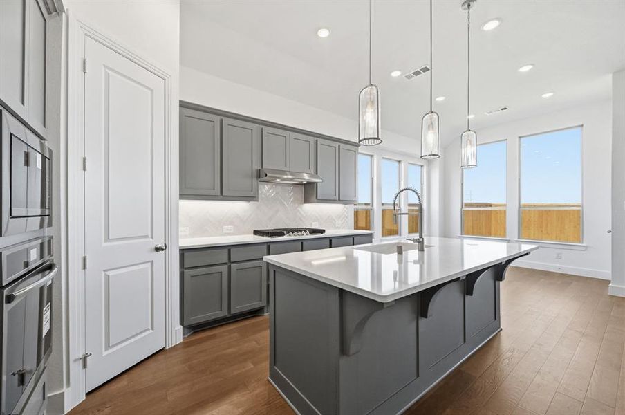 Furnished interior view inside a new home in Wildridge, Oak Point (Image 6).