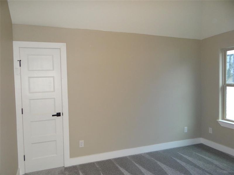 3rd Bedroom featuring plenty of natural light and carpet flooring