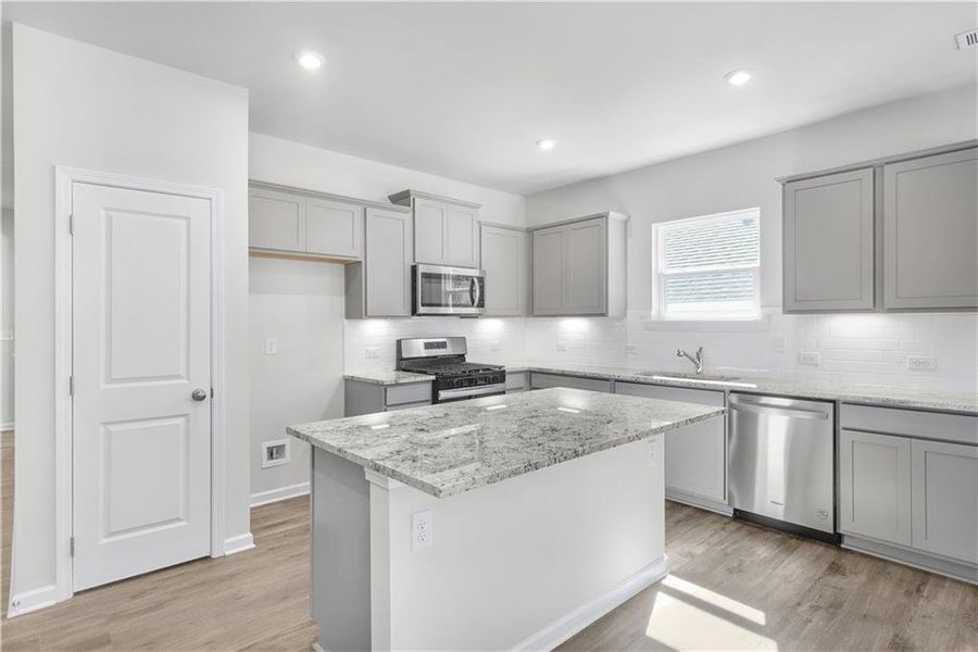 Furnished interior in a model home at Enclave at Parkway Village in Fairburn (Image 13).