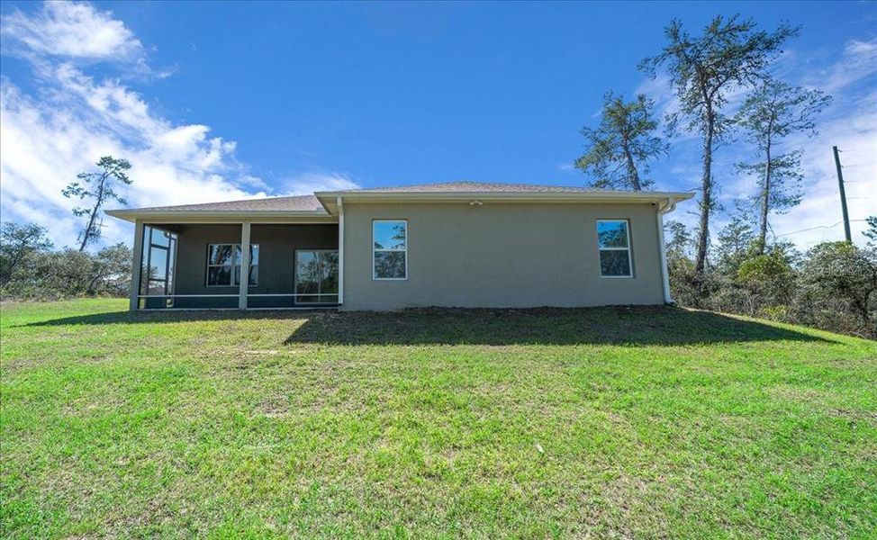 Exterior details and patio area of a home in , Ocala (Image 27).