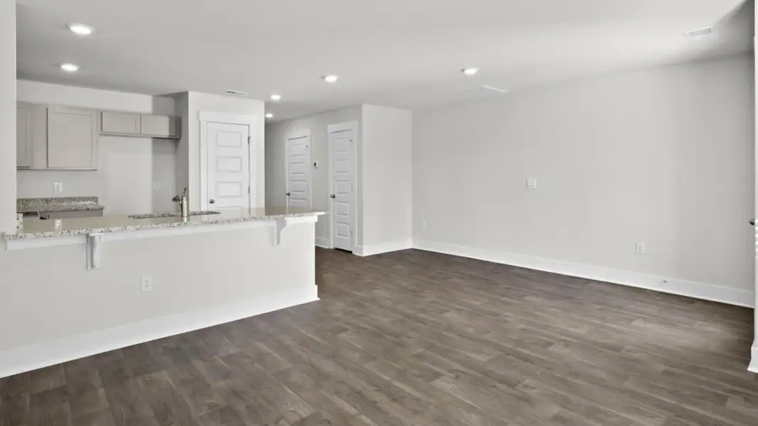 Spacious, unfurnished interior of a new home in The Townes at Cedar Hill Landing, Navassa (Image 16).