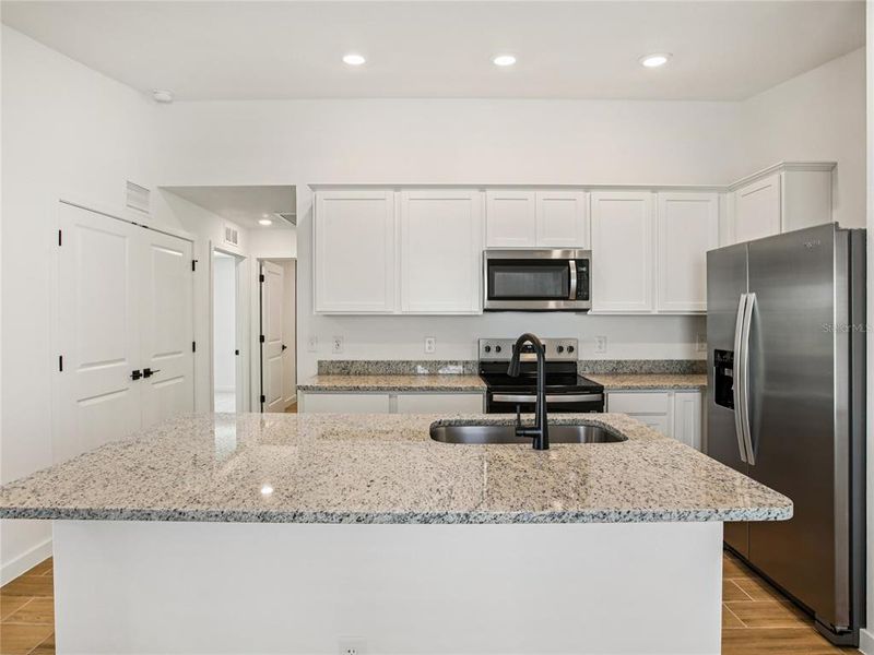 Furnished interior view inside a new home in Trilby Crossing, Brooksville (Image 4).