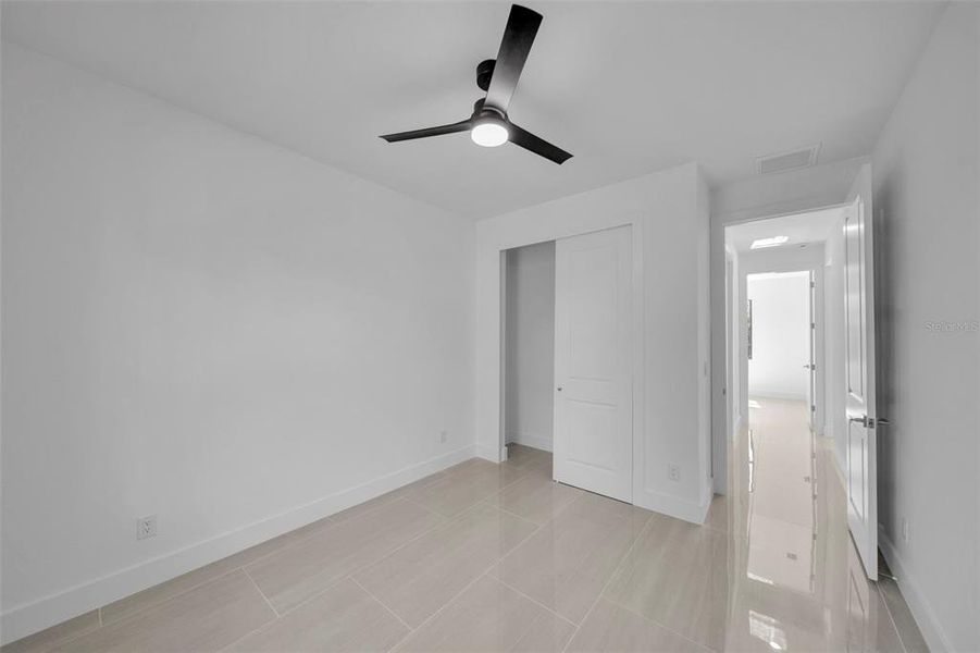 Spacious, unfurnished interior of a new home in , Port Charlotte (Image 19).