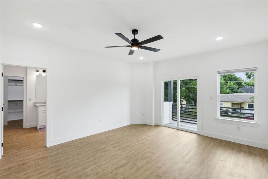 Unfurnished room featuring light hardwood / wood-style flooring and ceiling fan