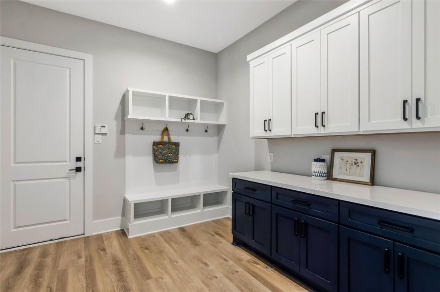 Convenient mudroom off the garage, perfect for organized storage and easy entry. Convenient mudroom off the garage, perfect for organized storage and easy entry.
