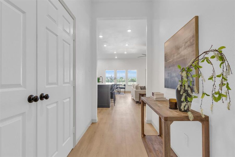 Hall with recessed lighting and light wood finished floors Hall with recessed lighting and light wood finished floors