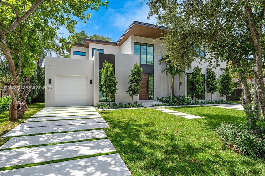 Front exterior of a new home in , Miami Shores, FL, highlighting curb appeal (Image 2). Front exterior of a new home in , Miami Shores, FL, highlighting curb appeal (Image 2).