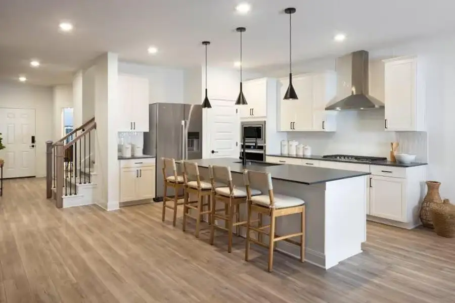 Photo of Pulte model home with same floor plan, not of actual home listed.