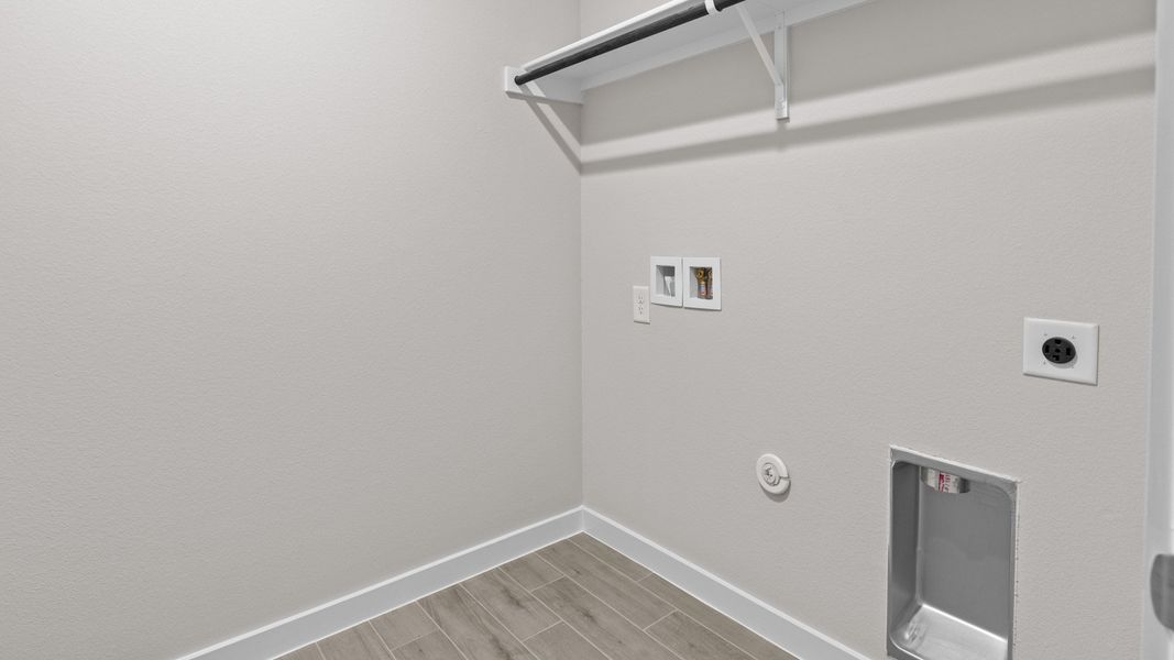 Representative unfurnished interior of a home built from the CARLSBAD by D.R. Horton in Northwest Passage, Midland (Image 16). Representative unfurnished interior of a home built from the CARLSBAD by D.R. Horton in Northwest Passage, Midland (Image 16).