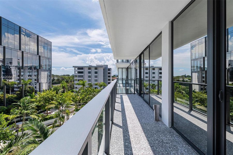 Condo located in Bay Harbor Islands, FL showcasing its design and architecture (Image 3).