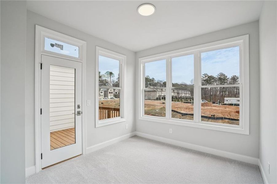 Spacious, unfurnished interior of a new home in Ward's Crossing Townhomes, Johns Creek (Image 16).
