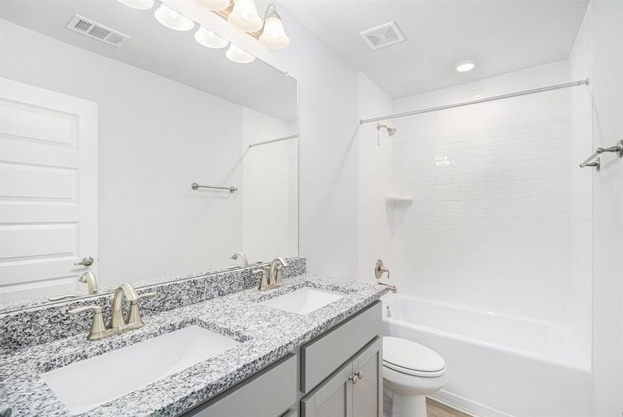 Main Bathroom with Double Vanity Sinks