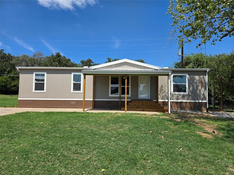 Exterior details and patio area of a home in , Pelican Bay (Image 16).