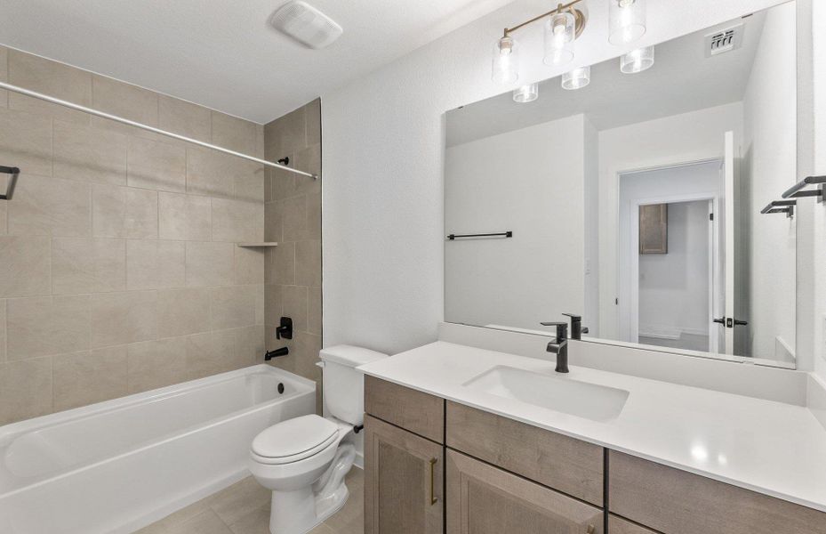 Furnished interior view inside a new home in Wolf Ranch, Georgetown (Image 10).