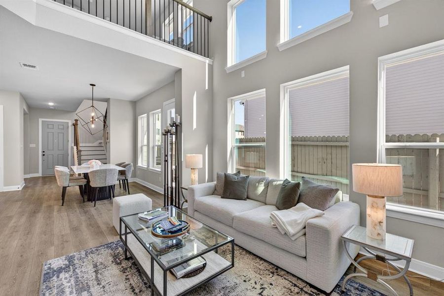 Open to dining and kitchen