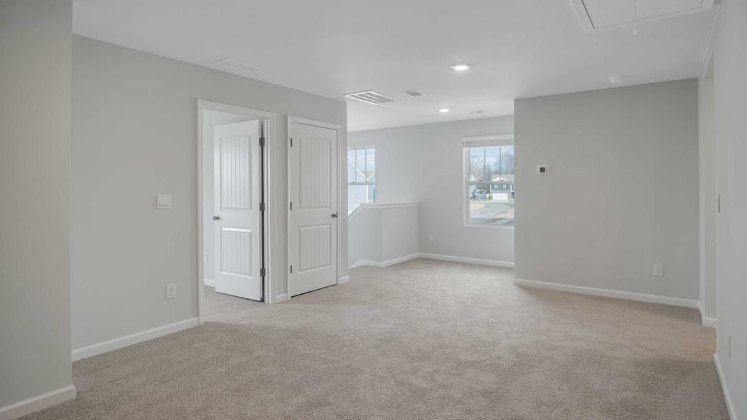 Spacious, unfurnished interior of a new home in The Parks, White House (Image 34). Spacious, unfurnished interior of a new home in The Parks, White House (Image 34).