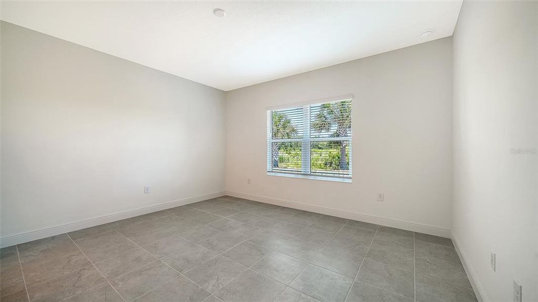 Spacious, unfurnished interior of a new home in Windward Real Estate and Homes for Sale in Sarasota, FL - Neal Communities, Lakewood Ranch (Image 26).