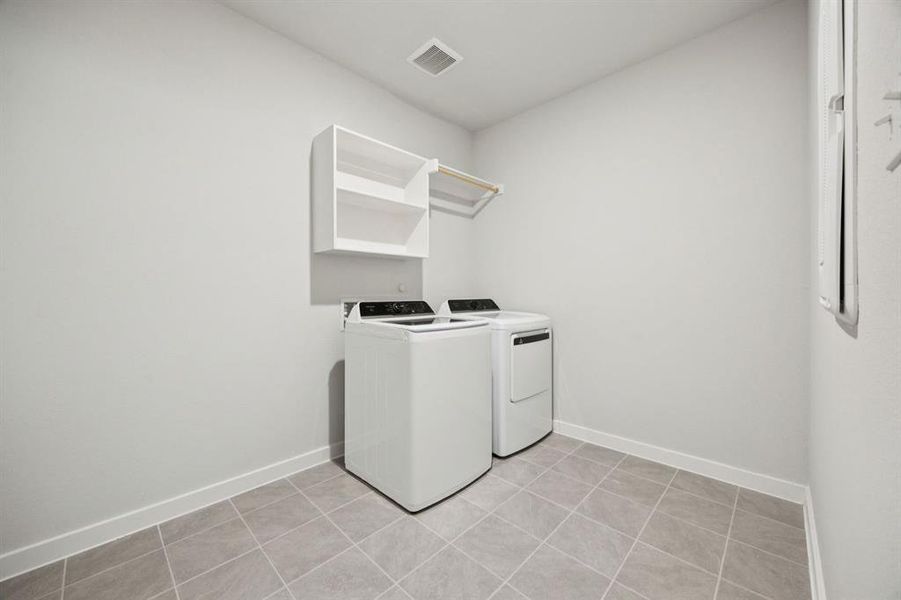 Utility Room in the Heisman home plan by Trophy Signature Homes – REPRESENTATIVE PHOTO