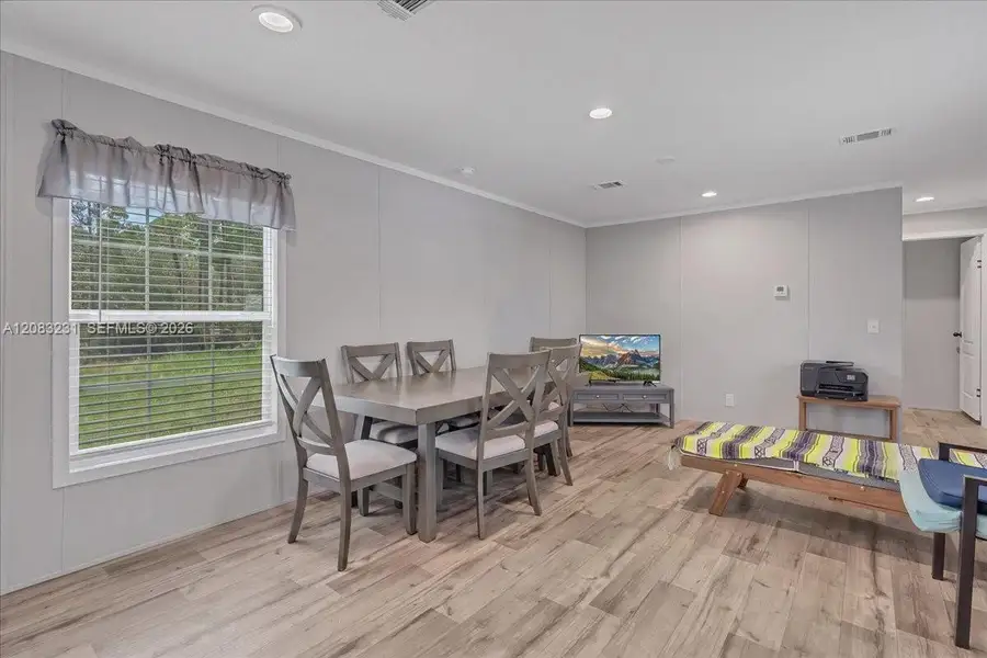 Furnished interior view inside a new home in , Clewiston (Image 4).