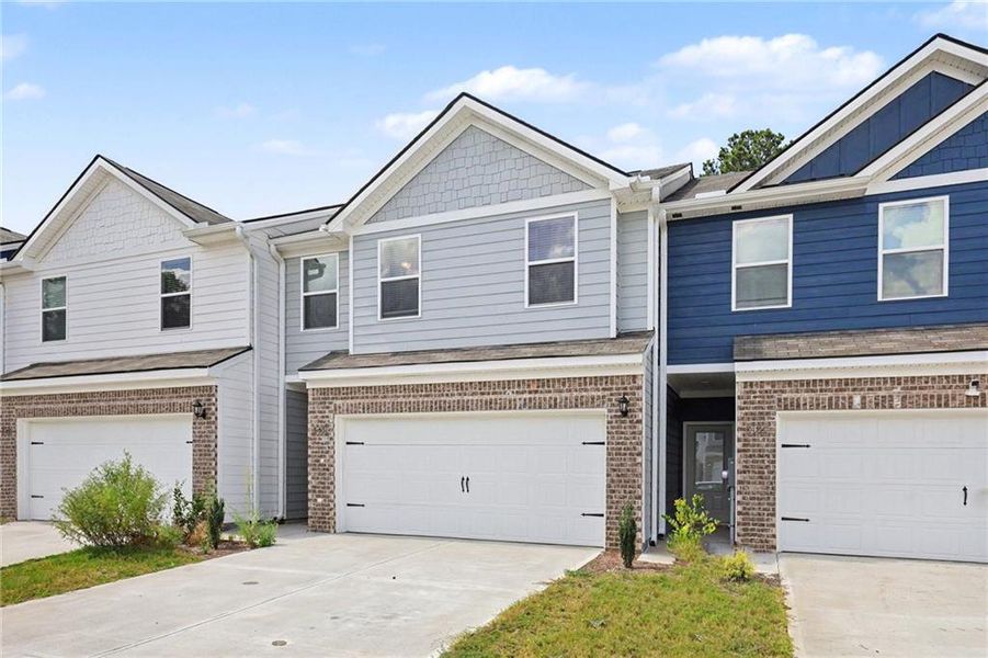 Front exterior of a new home in , Atlanta, GA, highlighting curb appeal (Image 25).