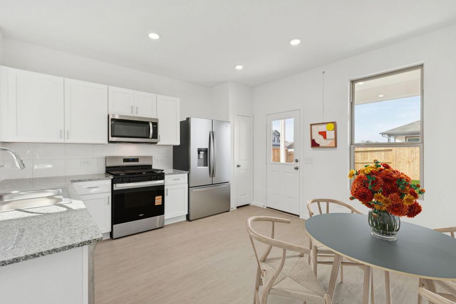 Furnished interior view inside a new home in Mavera, Conroe (Image 9).