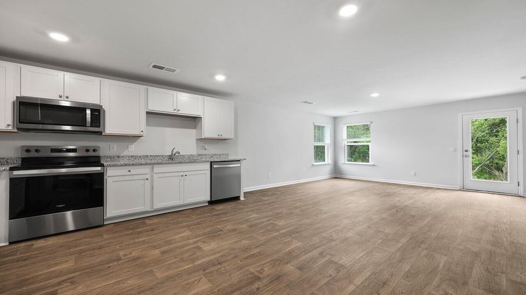 Furnished interior view inside a new home in Center Pointe, Santee (Image 8).