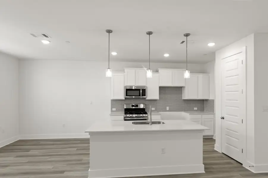 Furnished interior view inside a new home in Center 45, Round Rock (Image 6).