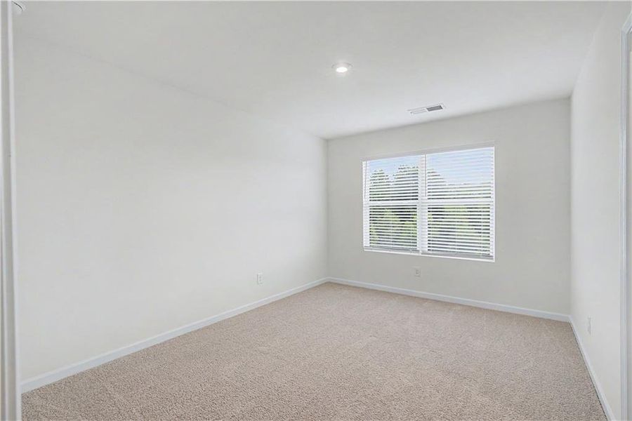 Spacious, unfurnished interior of a new home in The View at Groover's Lake, Lithia Springs (Image 24).