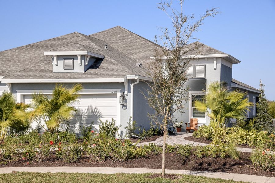 Representative exterior photo of a completed home built from the Tidewater 2 by Neal Communities in Wildleaf, Parrish, FL (Image 1). Representative exterior photo of a completed home built from the Tidewater 2 by Neal Communities in Wildleaf, Parrish, FL (Image 1).