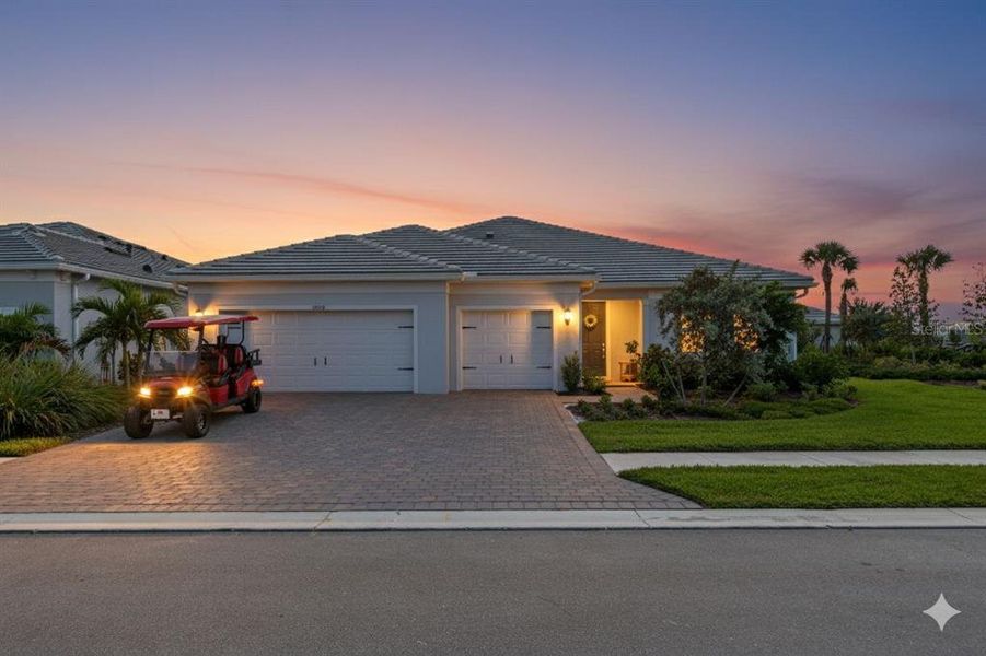 Front exterior of a new home in , Englewood, FL, highlighting curb appeal (Image 31). Front exterior of a new home in , Englewood, FL, highlighting curb appeal (Image 31).
