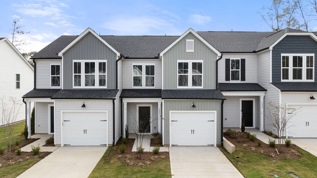 Front exterior of a new home in Poets Walk, Whitsett, NC, highlighting curb appeal (Image 2).