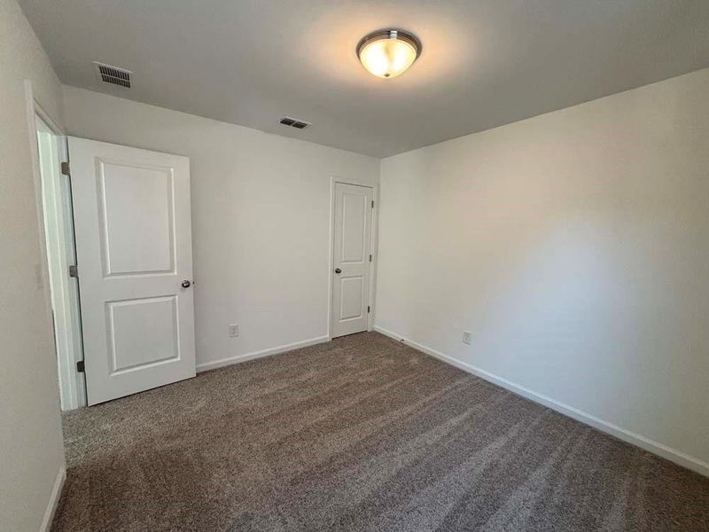 Spacious, unfurnished interior of a new home in Creekside, Dawsonville (Image 27).