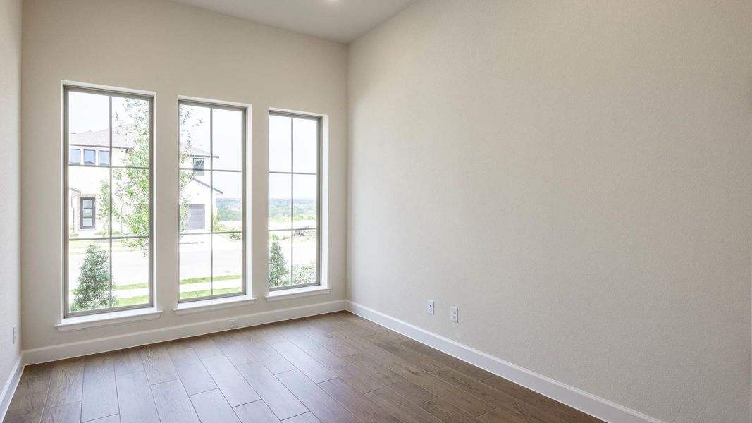 Spacious, unfurnished interior of a new home in Lariat 60', Liberty Hill (Image 11). Spacious, unfurnished interior of a new home in Lariat 60', Liberty Hill (Image 11).