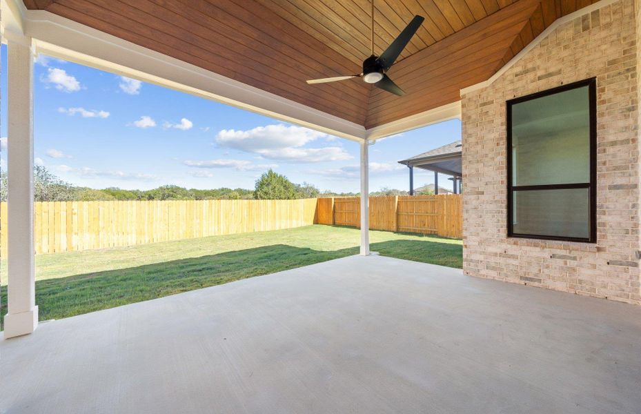 Exterior details and patio area of a home in 6 Creeks, Kyle (Image 17).