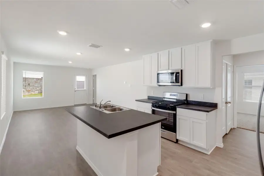 Furnished interior view inside a new home in Prairie Lakes, Buda (Image 8).