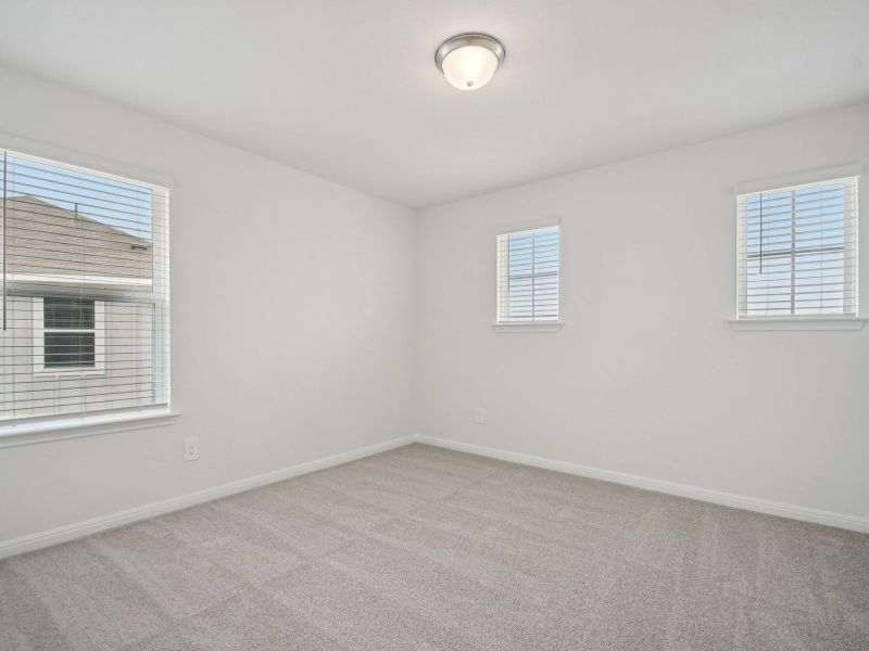 Spacious, unfurnished interior of a new home in Riverbend at Double Eagle - Boulevard Collection, Cedar Creek (Image 15).