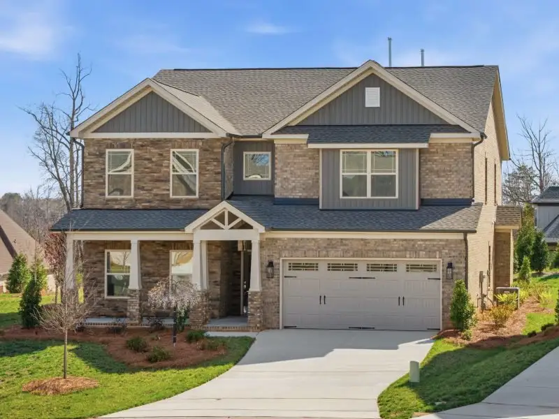 Front exterior of a new home in Blacksmith, Stokesdale, NC, highlighting curb appeal (Image 30).