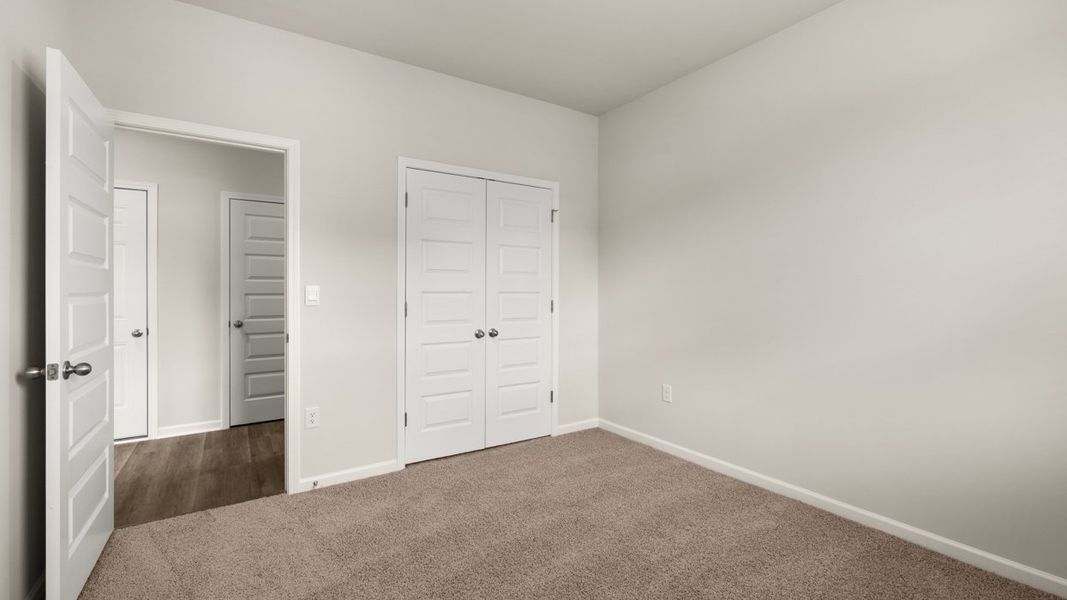 Spacious, unfurnished interior of a new home in Preserve at Dove Creek, Statham (Image 33).