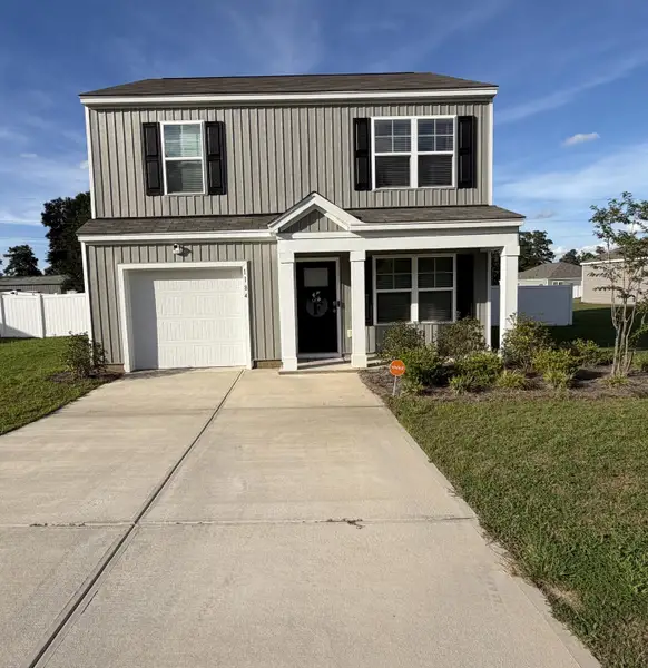 Front exterior of a new home in , Manning, SC, highlighting curb appeal (Image 1). Front exterior of a new home in , Manning, SC, highlighting curb appeal (Image 1).