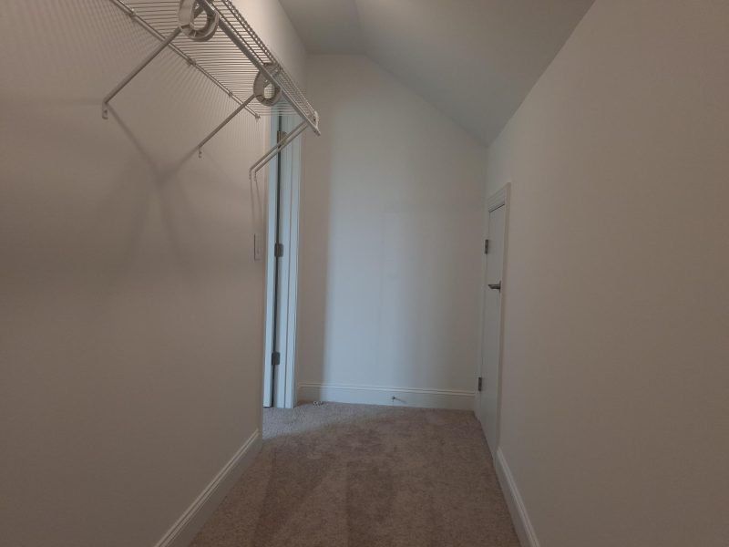 Spacious, unfurnished interior of a new home in Weybridge, Burlington (Image 64).