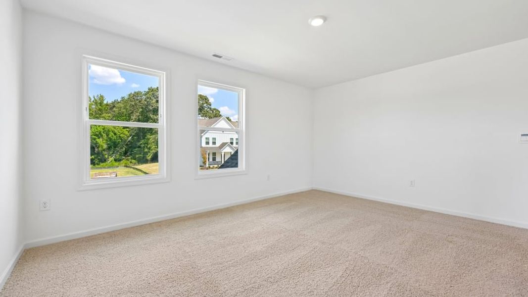 Spacious, unfurnished interior of a new home in Eagle Creek, Fuquay Varina (Image 24).